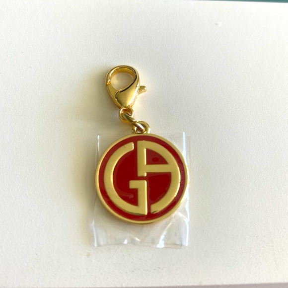 Giorgio Armani Jewelry - Giorgio Armani promotional charm.